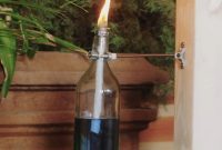 Turn Empty Bottles into Enchanting Tiki Torches