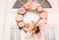 Natural Branch Slice Wreath Adorned with Pinecones