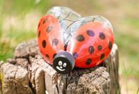 Charming Ladybug Garden Decor from Upcycled Bottles