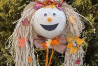 Charming Upcycled Straw Hat Lady Scarecrow for Harvest