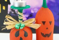 Crafting Charming Wine Glass Pumpkin Art