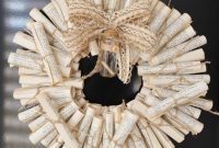 Artful Scroll Wreath from Repurposed Book Pages