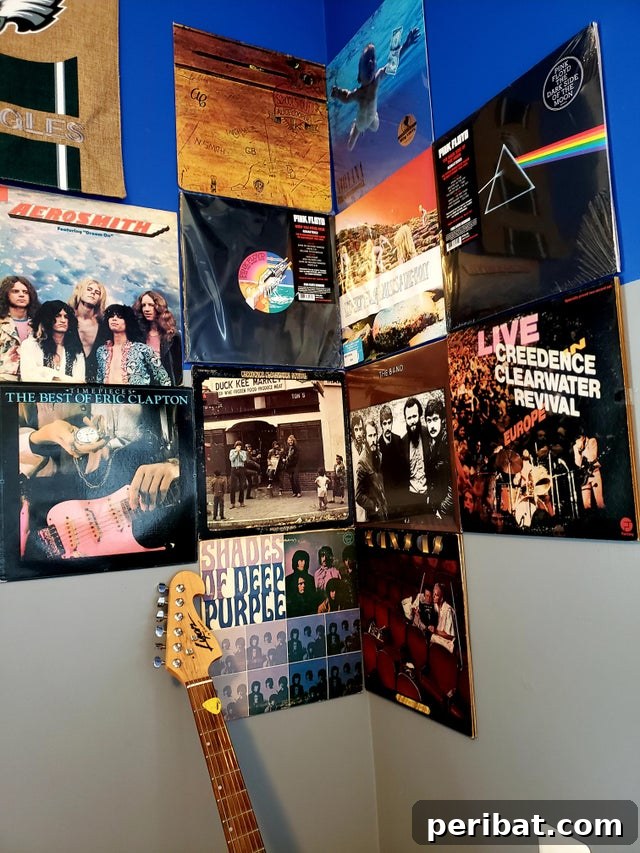 The Ultimate Command Strip Guide 75 Ingenious Uses and Application Tips 3 Vinyl records artfully arranged on a wall using Command Strips.