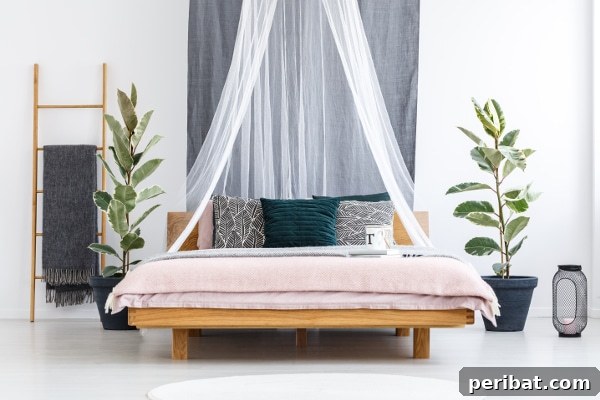 The Ultimate Command Strip Guide 75 Ingenious Uses and Application Tips 6 A bed adorned with a flowing canopy, suspended from the ceiling with Command Hooks.