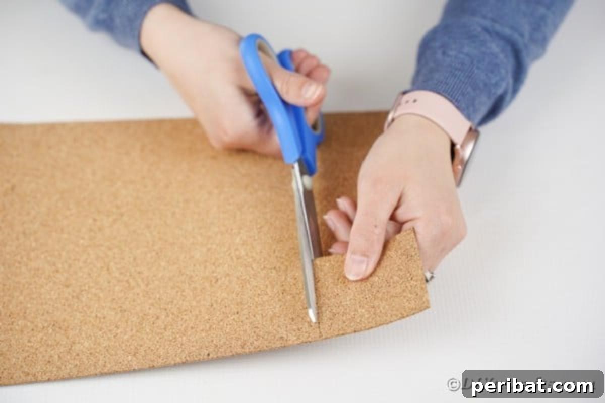 Cutting cork sheet into book binding