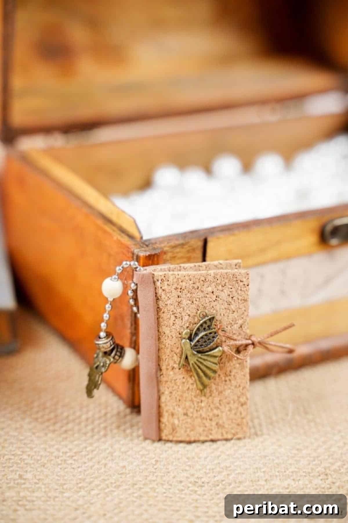 Mini book against wooden chest