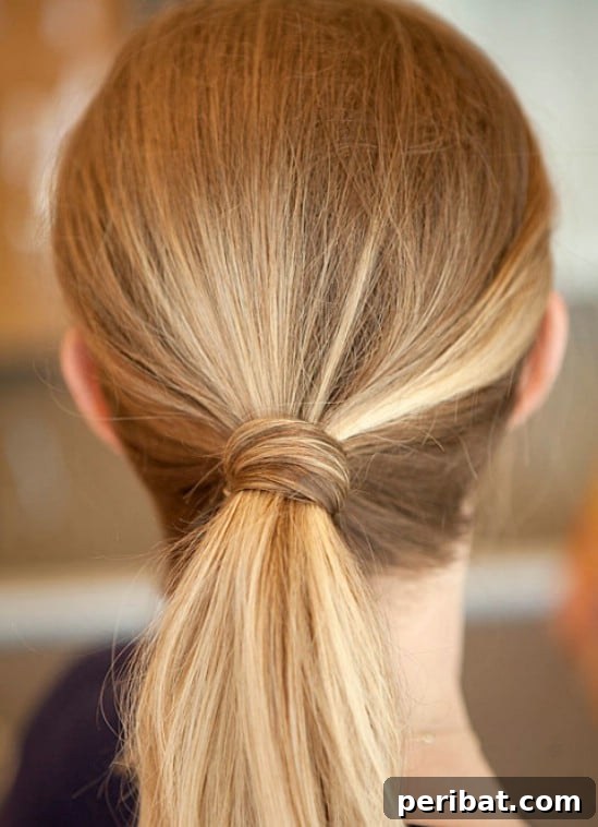 Bobby Pins: Your Secret Style Weapon 22 Wrapped Ponytail - 21 Unexpectedly Stylish Ways to Wear Bobby Pins - Glam Ponytail Upgrade
