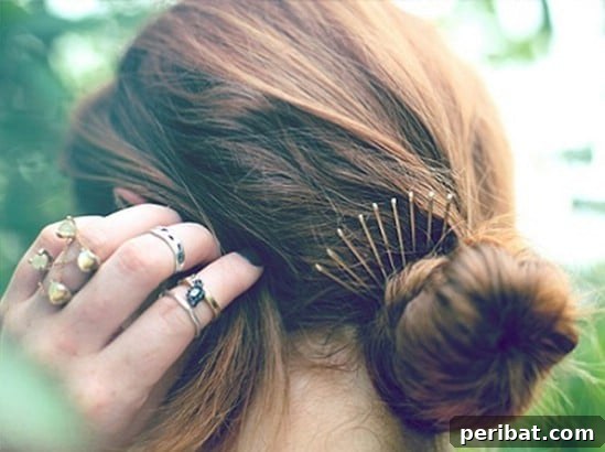 Bobby Pins: Your Secret Style Weapon 9 Crown - 21 Unexpectedly Stylish Ways to Wear Bobby Pins - Bun Embellishment