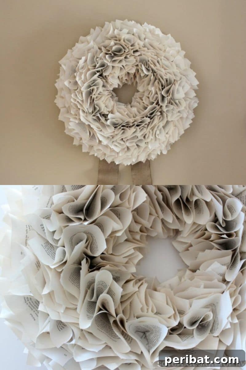 Beautiful crumpled paper wreath made from book pages, accented with ribbons on a wall
