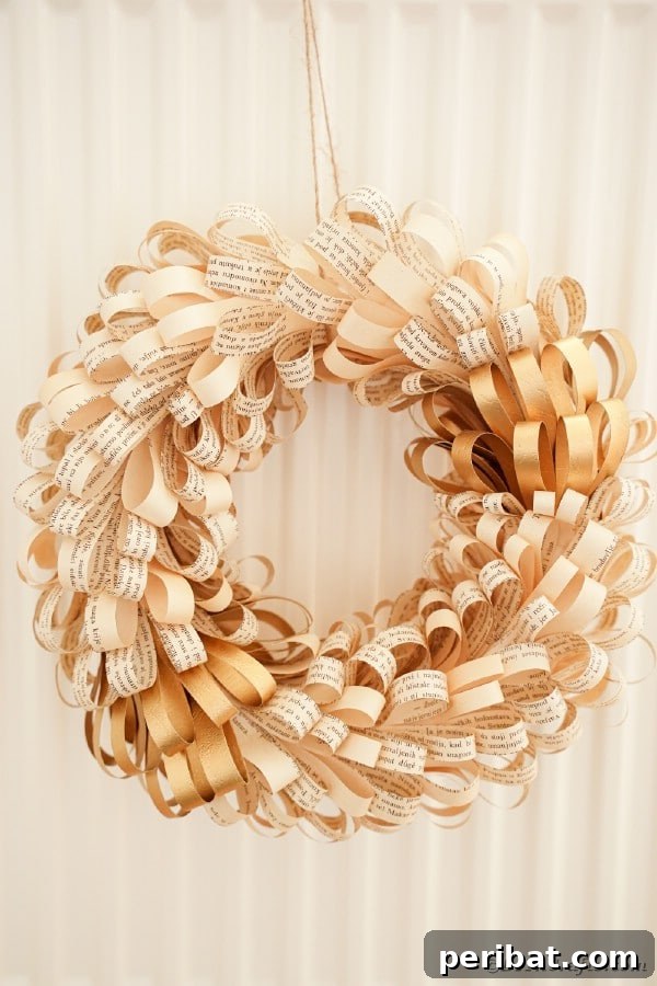 Simple and pretty paper rolls wreath crafted from old book pages