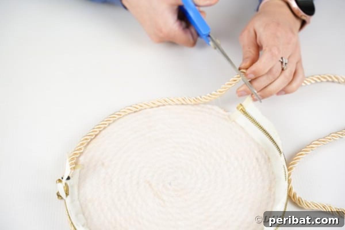 Effortless Chic DIY Rope Bag Tutorial 17 Gluing additional rope vertically to the edge of the circle to create the side wall