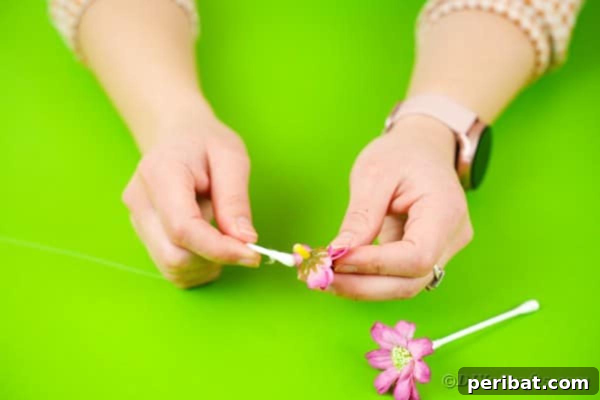 Gluing flowers on qtips