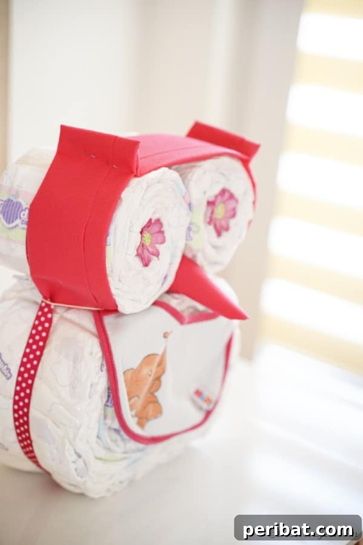 Owl diaper cake with creative eyes and ears