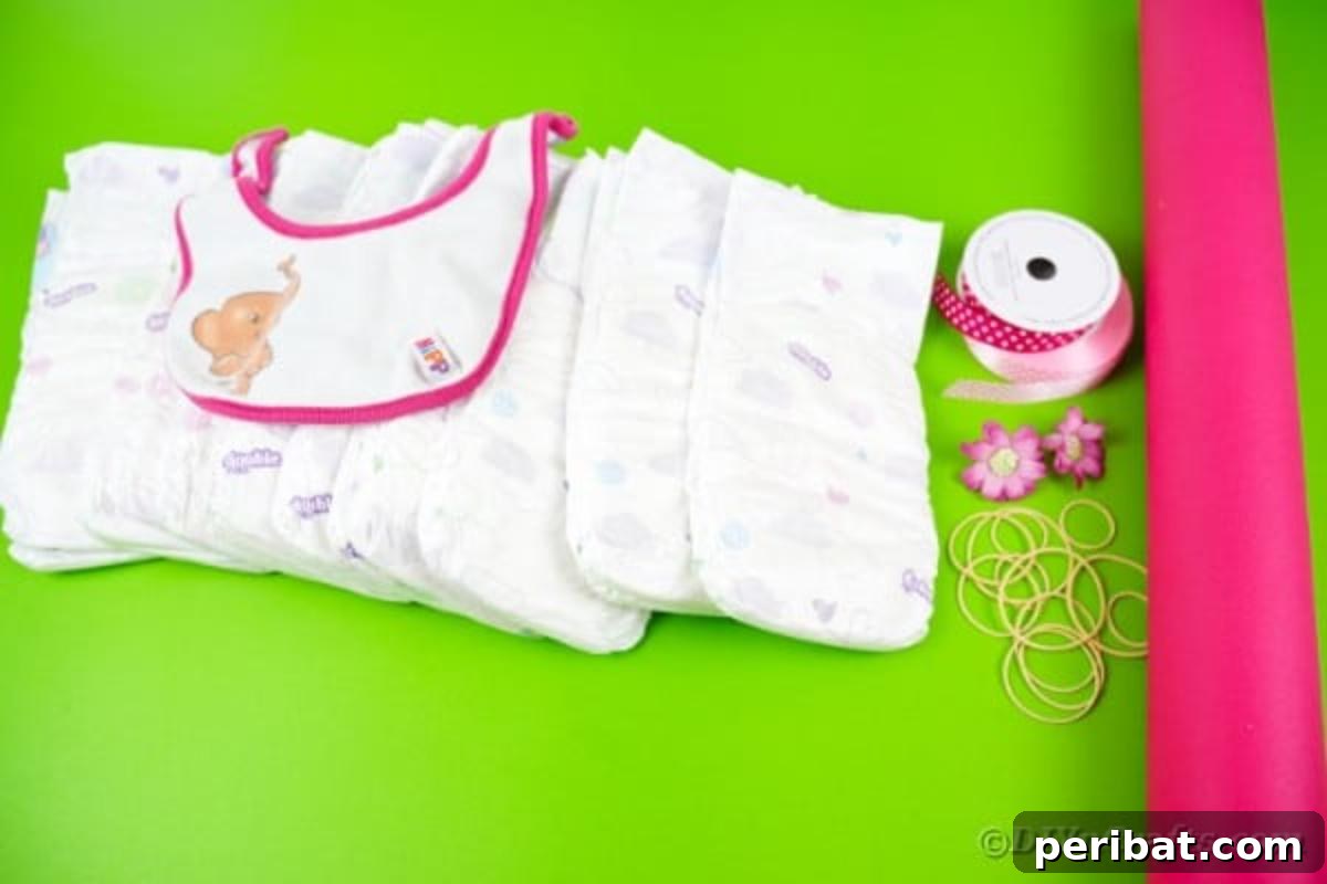 Supplies for an owl diaper cake