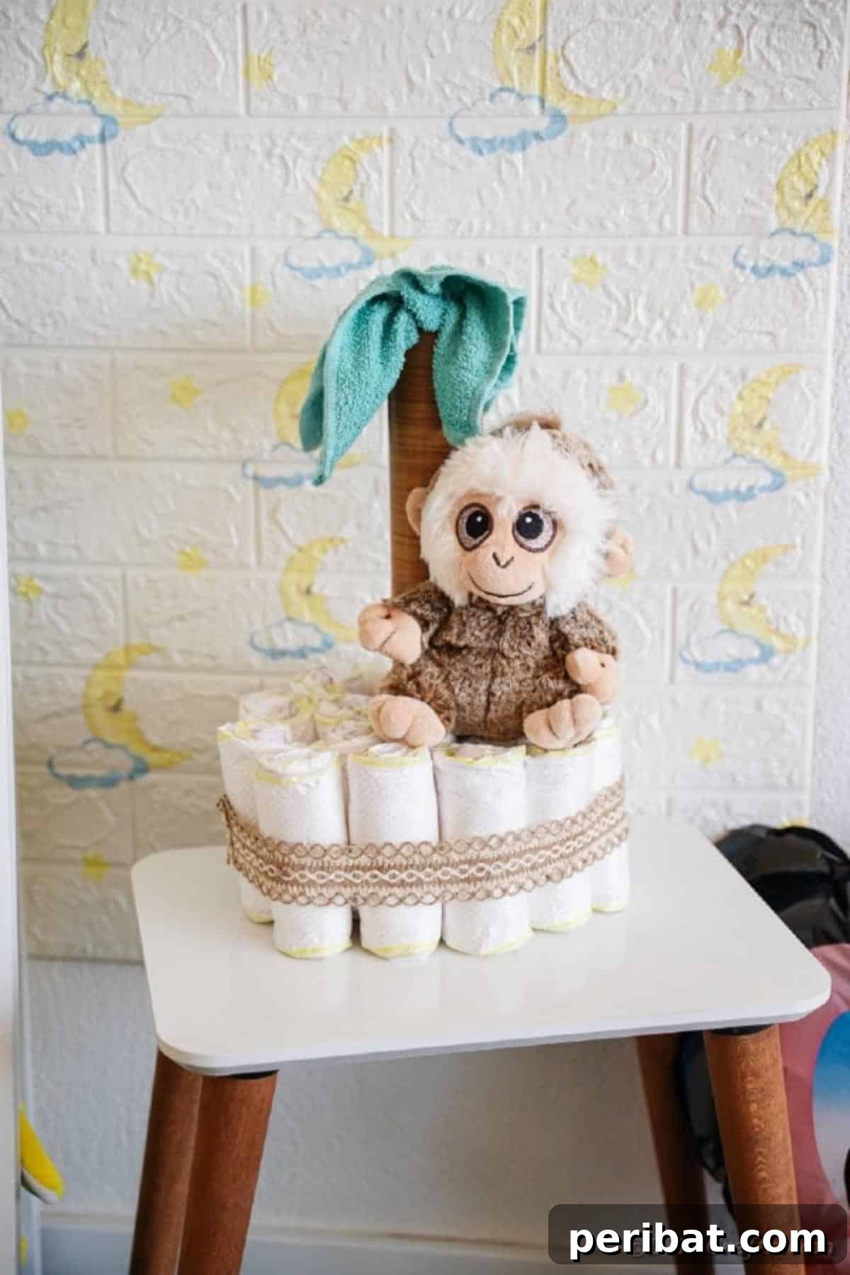 Sweet Safari Palm Diaper Cake 21 Diaper cake by white brick wall