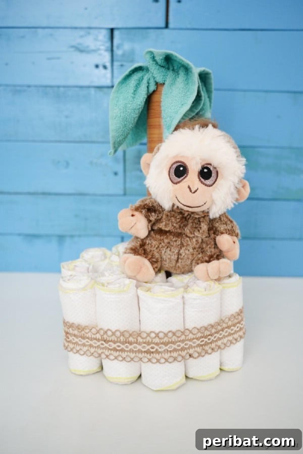 Sweet Safari Palm Diaper Cake 23 Palm tree diaper cake by blue wall