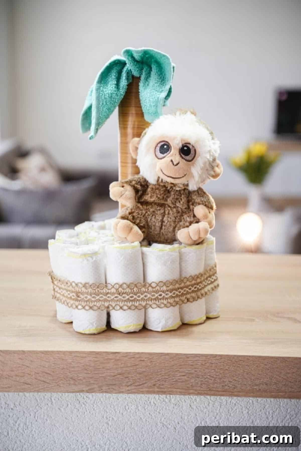Sweet Safari Palm Diaper Cake 25 Jungle palm tree diaper cake on wood table