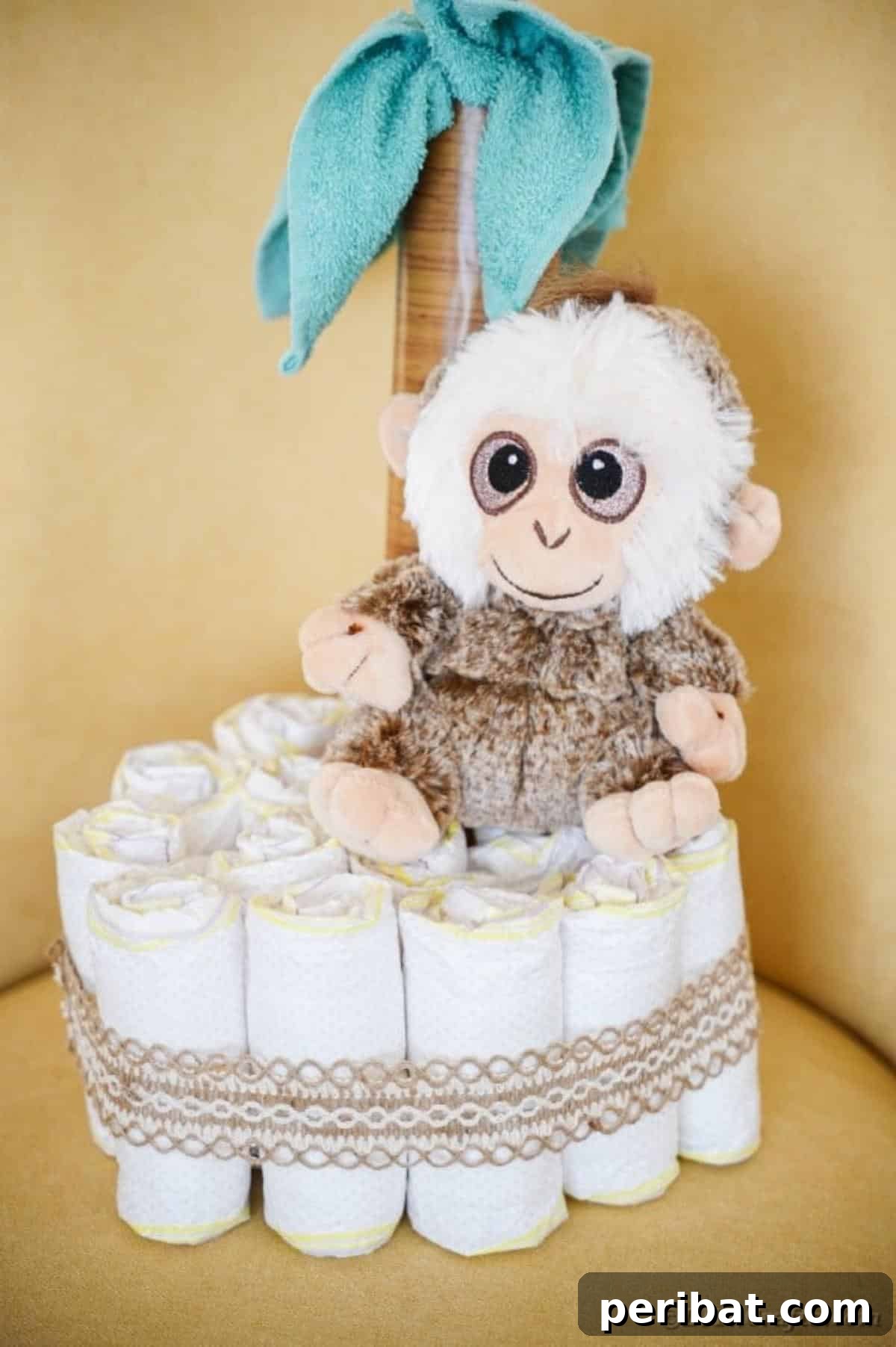 Sweet Safari Palm Diaper Cake 5 Palm tree diaper cake in yellow chair