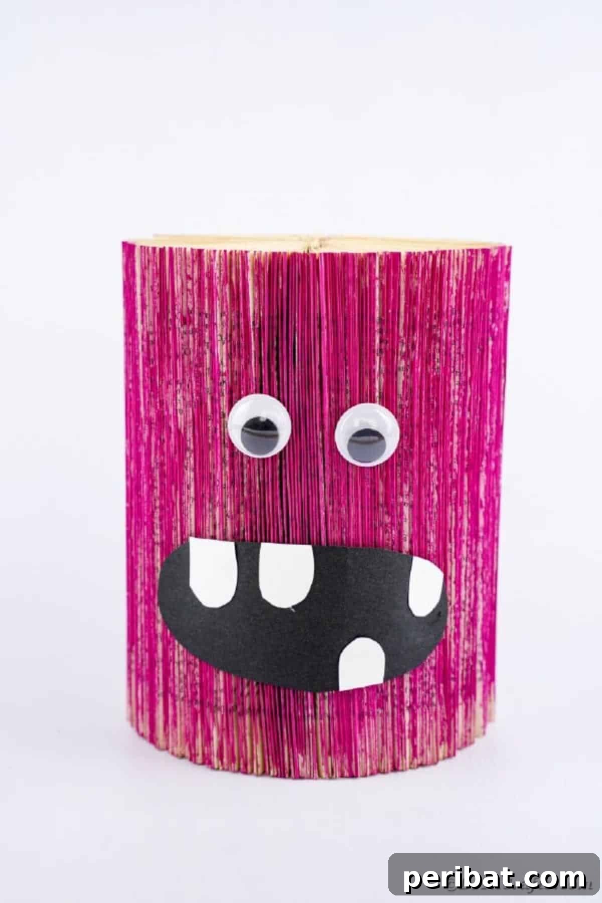 Pink monster on white table