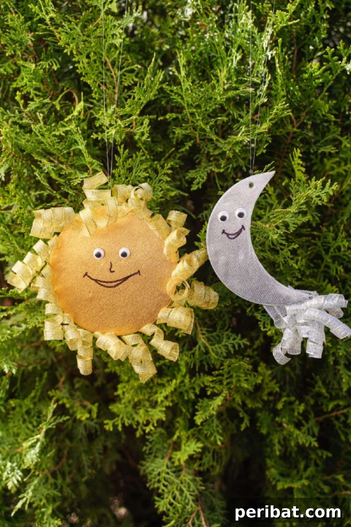 Sparkling CD Moon & Sun Nursery Mobile 24 Sun and moon on green cedar bush