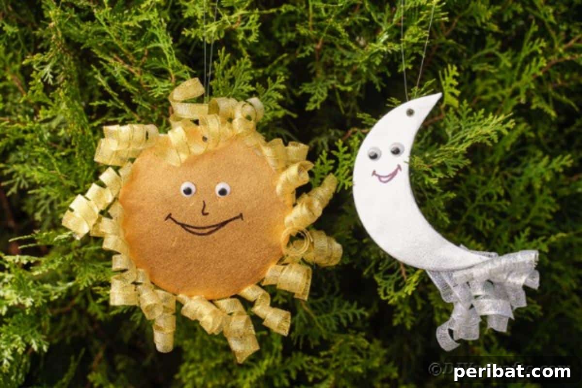 Sparkling CD Moon & Sun Nursery Mobile 4 Sun and moon on green cedar bush