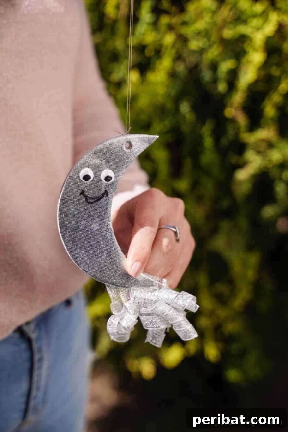 Sparkling CD Moon & Sun Nursery Mobile 27 Woman holding up moon