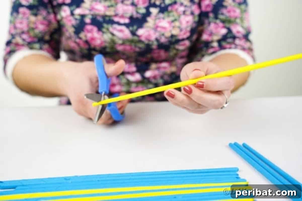 Trimming the ends of paper straws for an even finish