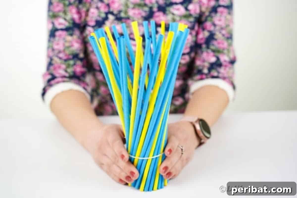 Vase with paper sticks arranged in a twisted pattern