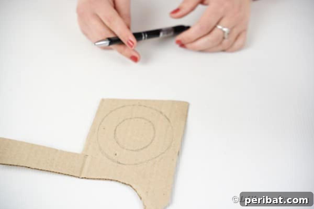 Tracing a concentric circle on cardboard for inner support
