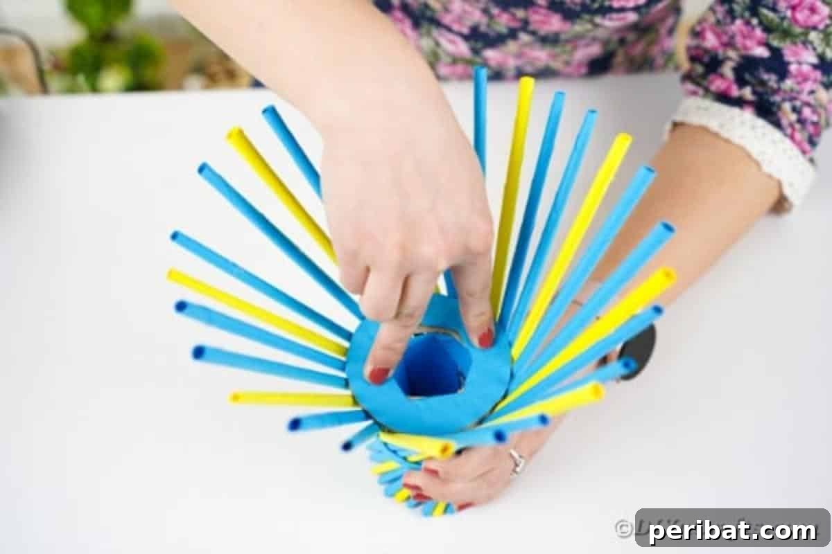 Adding a covered cardboard ring to the middle of the vase for support