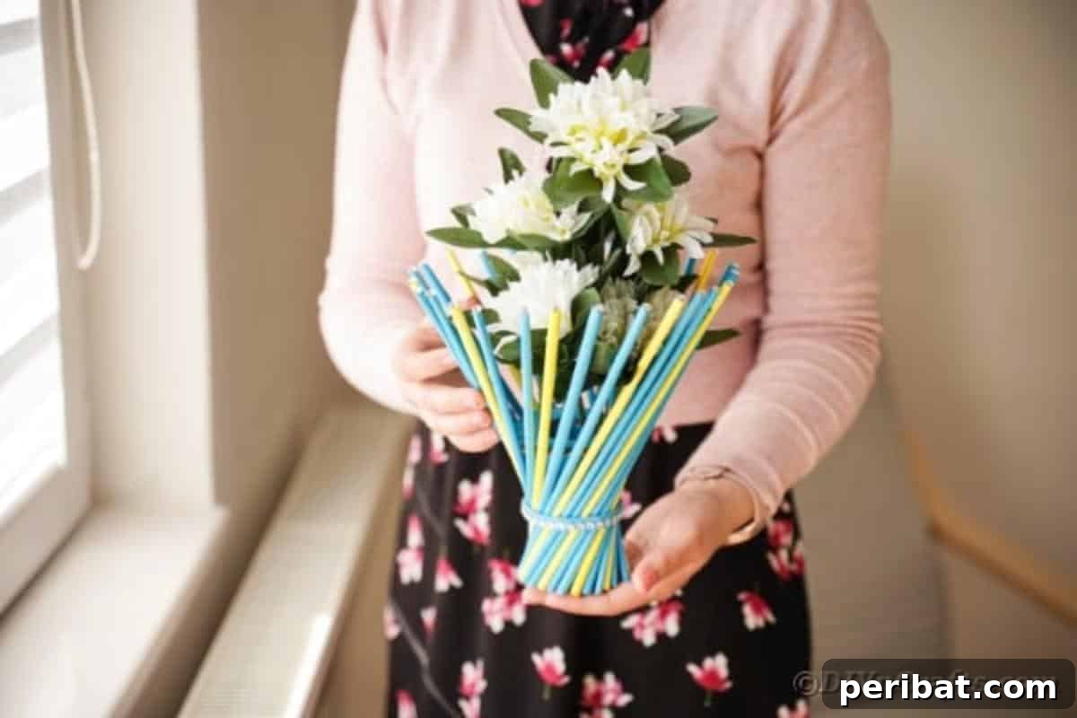 Woman holding twisted vase with decorative beads