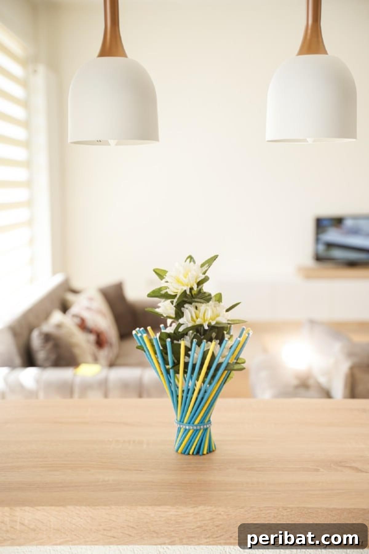 Side view of the colorful twisted paper straw vase on a wood table