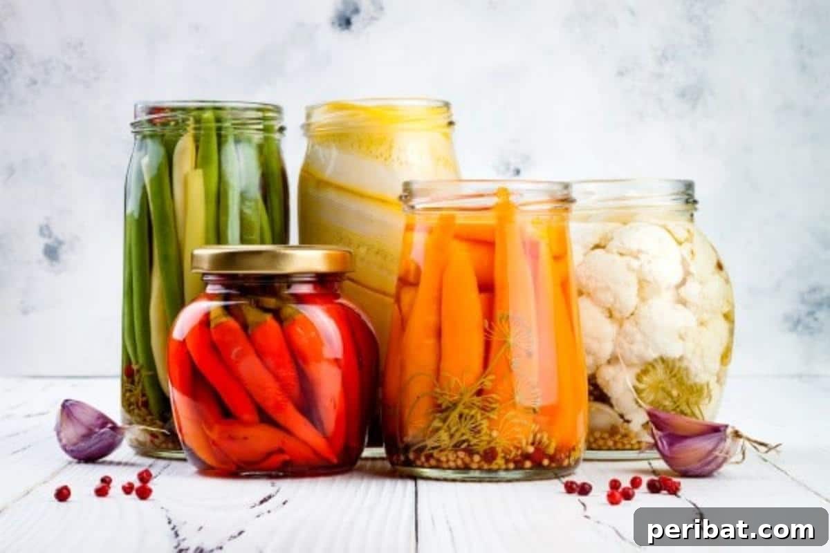 Extend Your Garden Harvest: 3 Simple Preservation Methods and 20 Flavorful Recipes 3 Mason jars of vegetables
