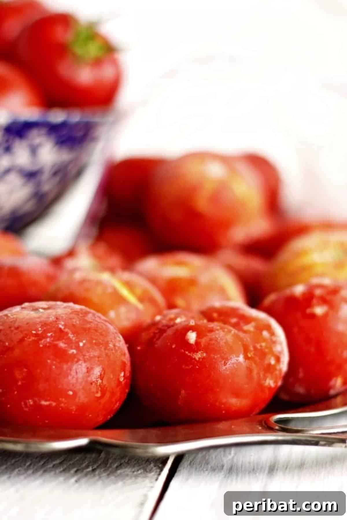 Extend Your Garden Harvest: 3 Simple Preservation Methods and 20 Flavorful Recipes 30 Frozen tomatoes on counter