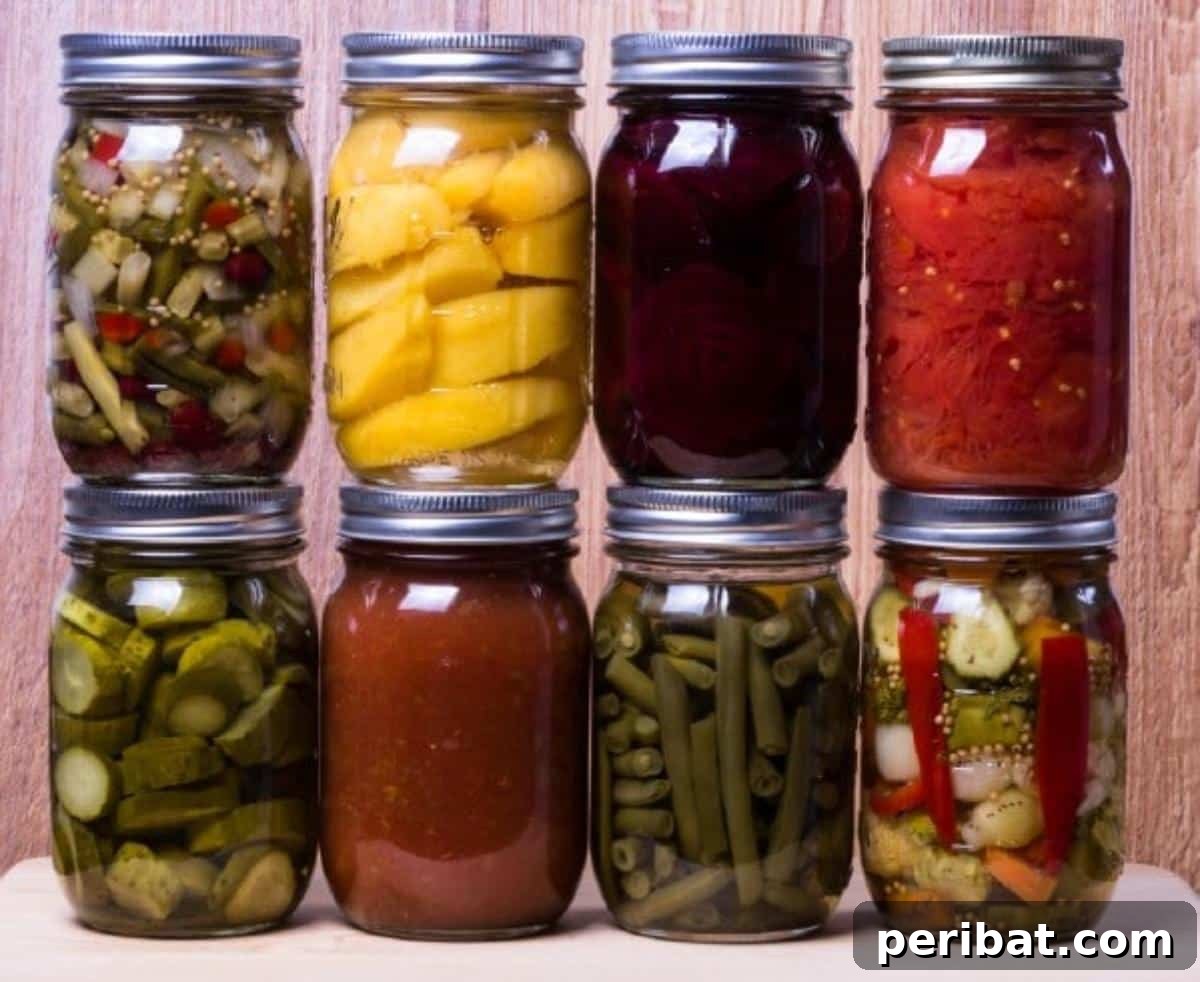 Extend Your Garden Harvest: 3 Simple Preservation Methods and 20 Flavorful Recipes 4 Stacks of canned vegetables in mason jars