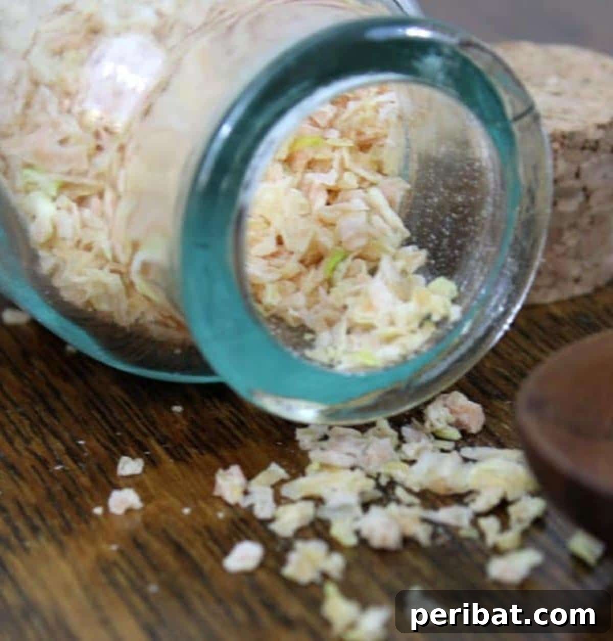 Extend Your Garden Harvest: 3 Simple Preservation Methods and 20 Flavorful Recipes 31 Dehydrated onions spilling out of jar