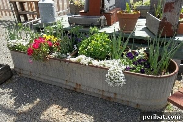 32 DIY Vintage Garden Crafts to Add Rustic Charm 31 An old metal farm trough creatively used as a large planter, filled with green foliage and flowers, for a rustic garden look.