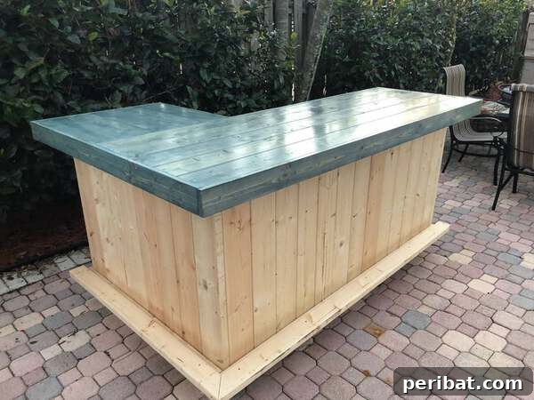 Build Your Best Backyard Bar: 45 DIY Ideas for Effortless Gatherings 15 Blue top wood l shape bar