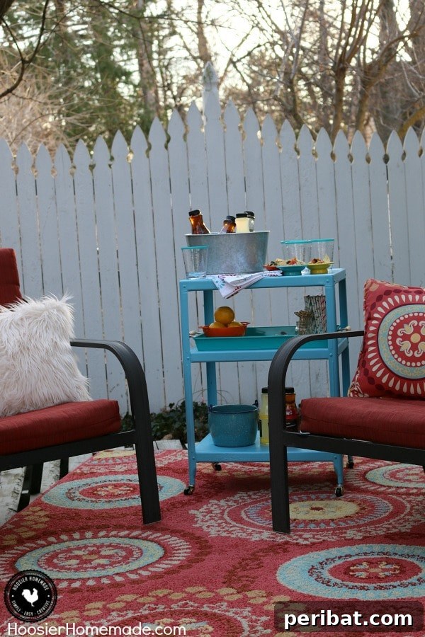 Build Your Best Backyard Bar: 45 DIY Ideas for Effortless Gatherings 21 Teal rolling cart bar