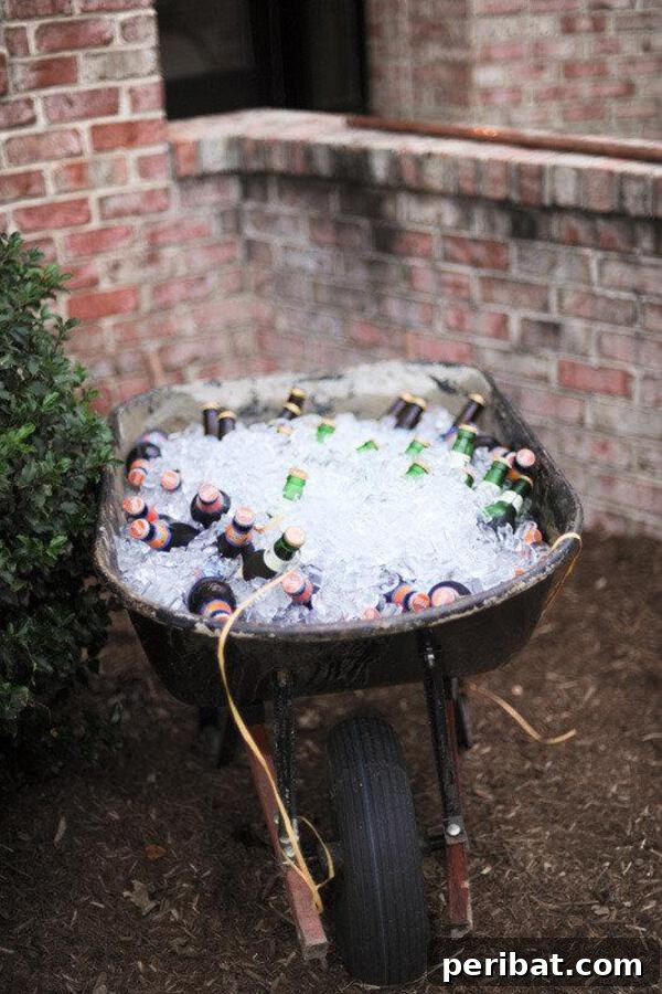 Build Your Best Backyard Bar: 45 DIY Ideas for Effortless Gatherings 34 Wheel barrow with drinks and ice