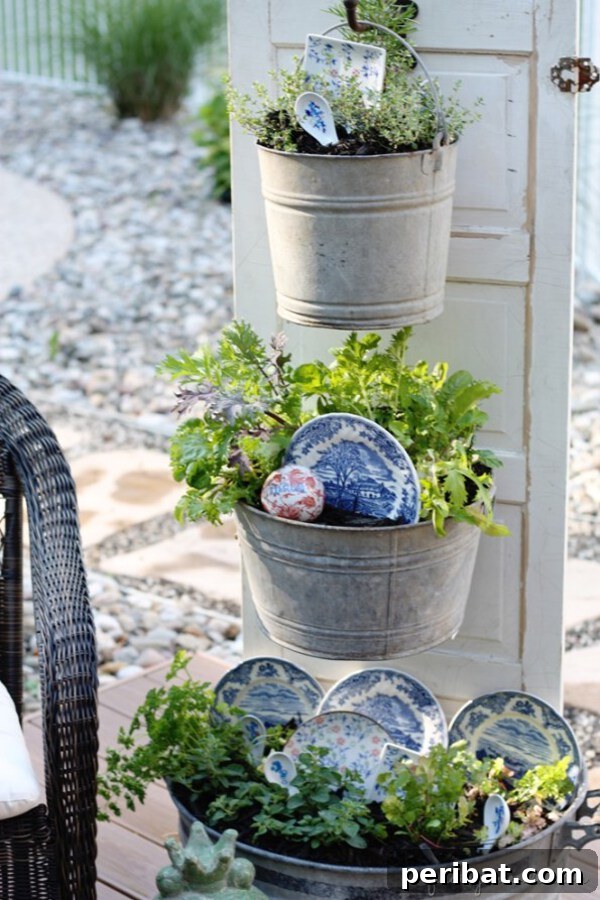 Old door kitchen herb garden with hanging buckets