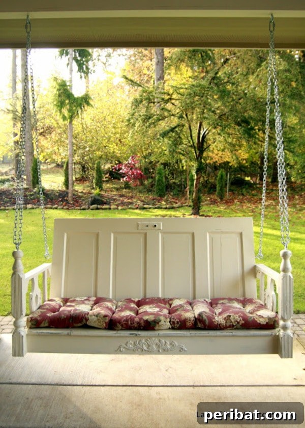 old door porch swing made from repurposed materials