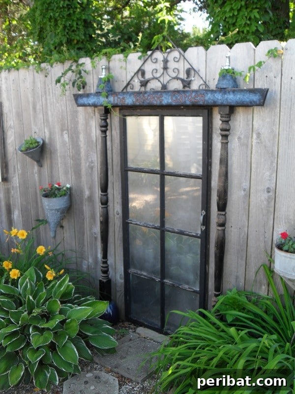 Garden wall adorned with a salvaged old door decor