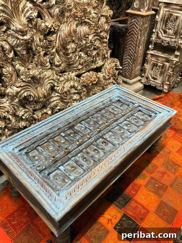 Ornate door coffee table with distressed blue finish