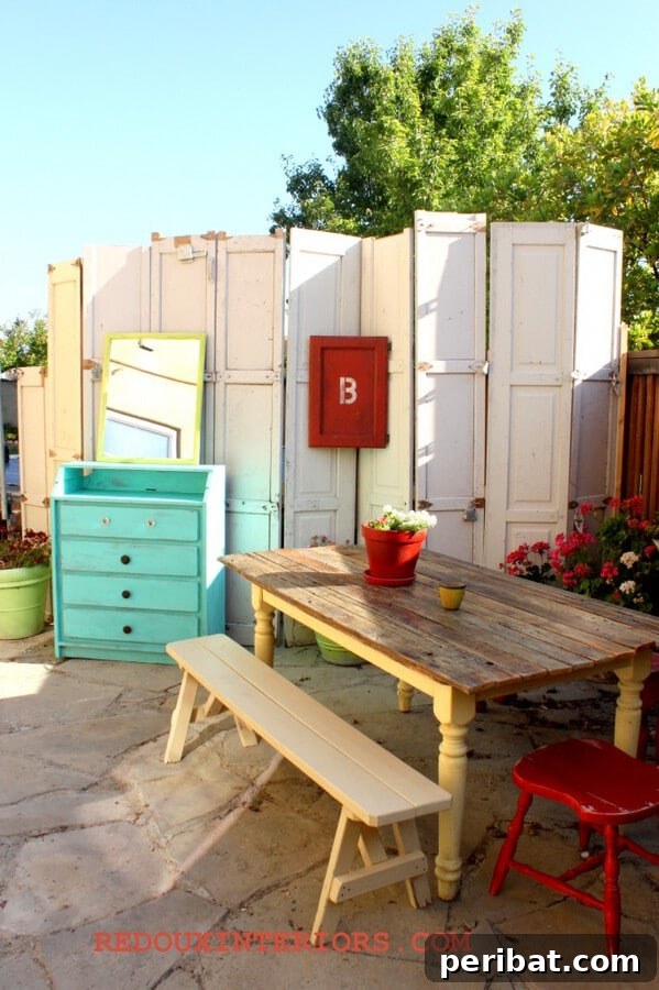 Garden door divider made from multiple reclaimed wooden doors