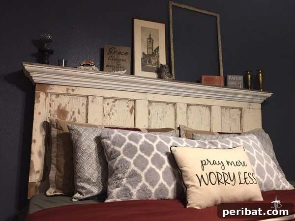 old door headboard with weathered paint styling