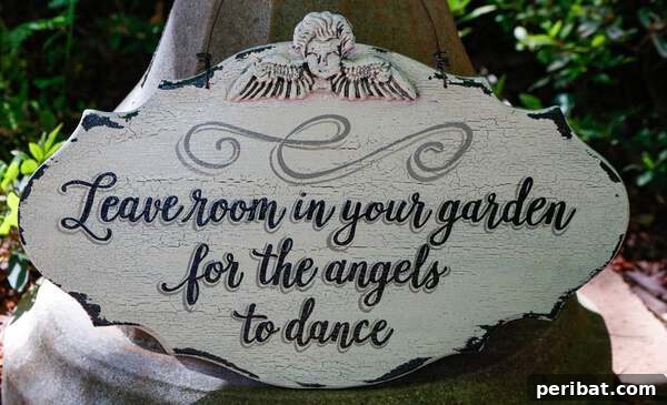 Decorative garden plaque with the quote 'Leave room in your garden for the angels to dance'