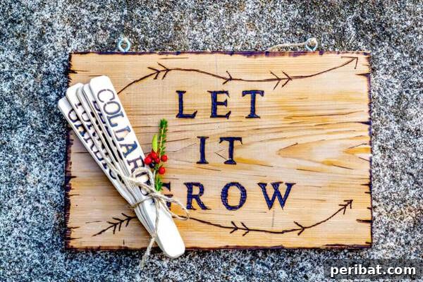 Wood-burned 'Let it Grow' sign with small craft stick plant markers
