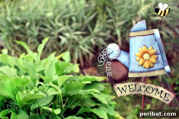 Metal watering can repurposed as a welcome sign with sunflower and bee accents