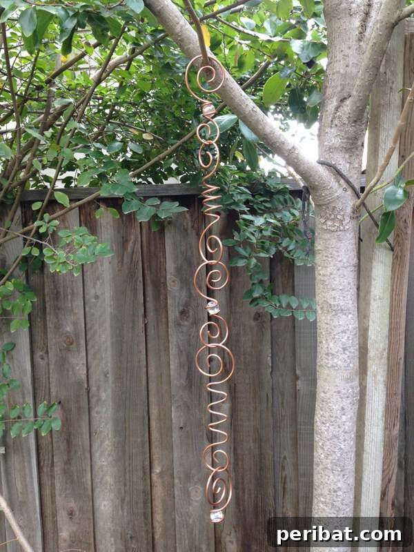 Elevate Your Outdoors with DIY Hanging Accents 11 Wire wrapped decor